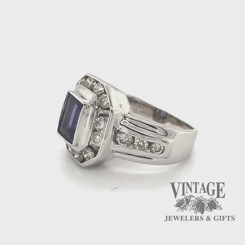 Revolving video of 14 karat white gold 1ct emerald cut Tanzanite and diamond ring
