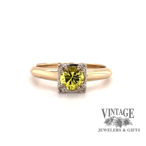 Revolving video of14 karat two tone gold round Golden sapphire ring