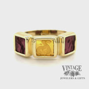 Revolving video of 18 karat yellow gold carved cherub Intaglio three stone ring