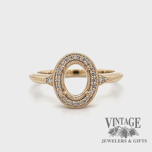 Revolving video of 14 karat yellow gold oval semi-mount engagement ring