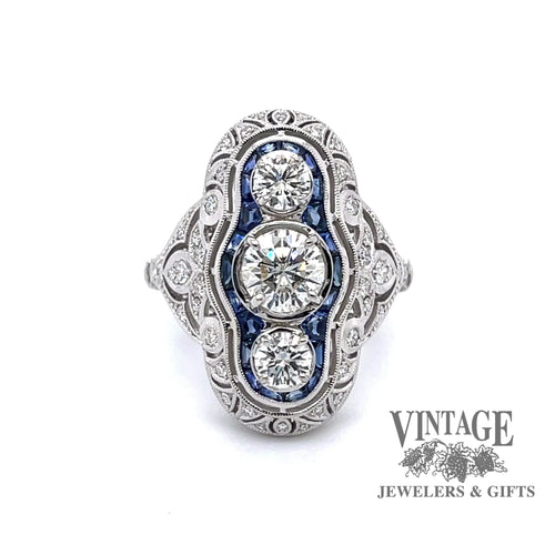 Revolving video of 14k white gold vintage inspired filigree 3-stone diamond and sapphire ring