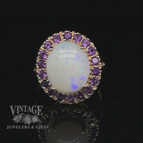 Revolving video of 10 karat yellow gold white opal and amethyst halo ring