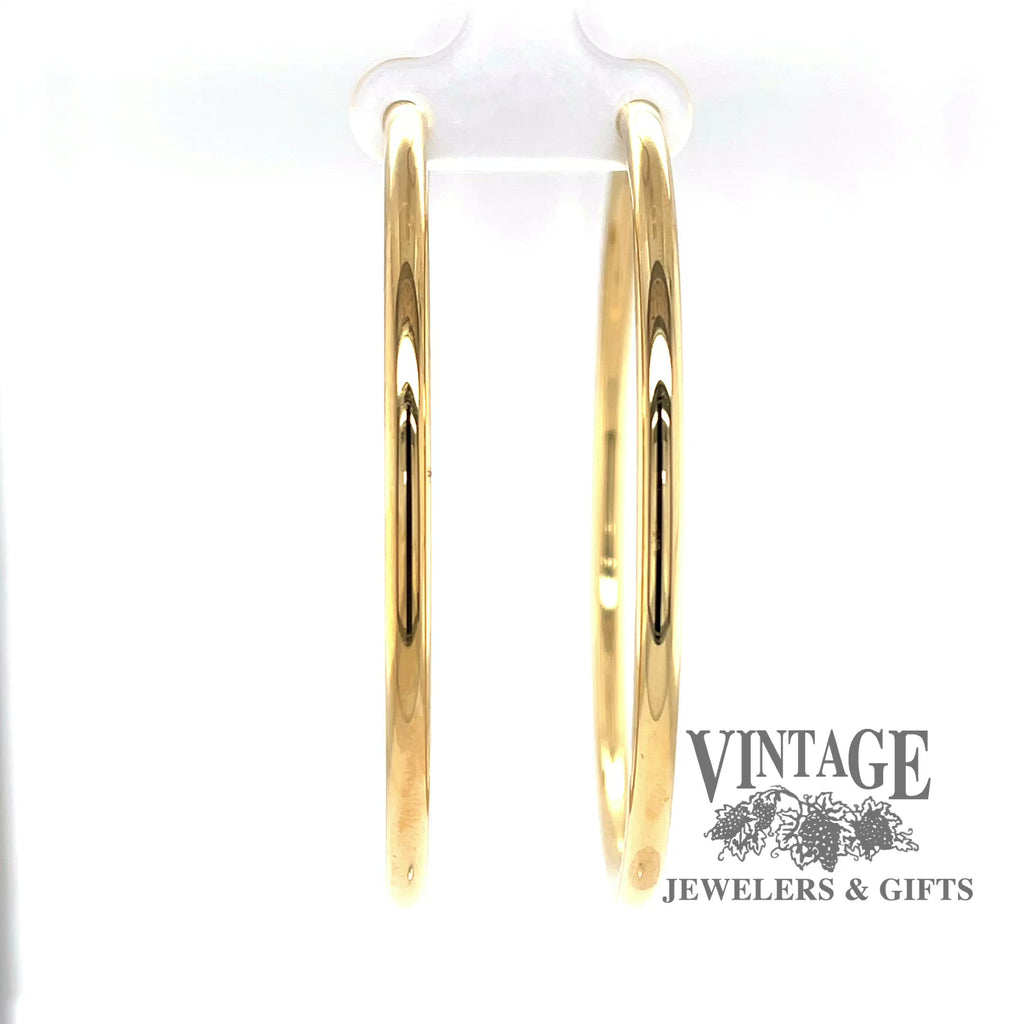 Revolving video of endless extra large 14k gold hoops