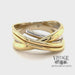 Revolving video of Contemporary 18 karat two tone, yellow and white gold multi-band look ring