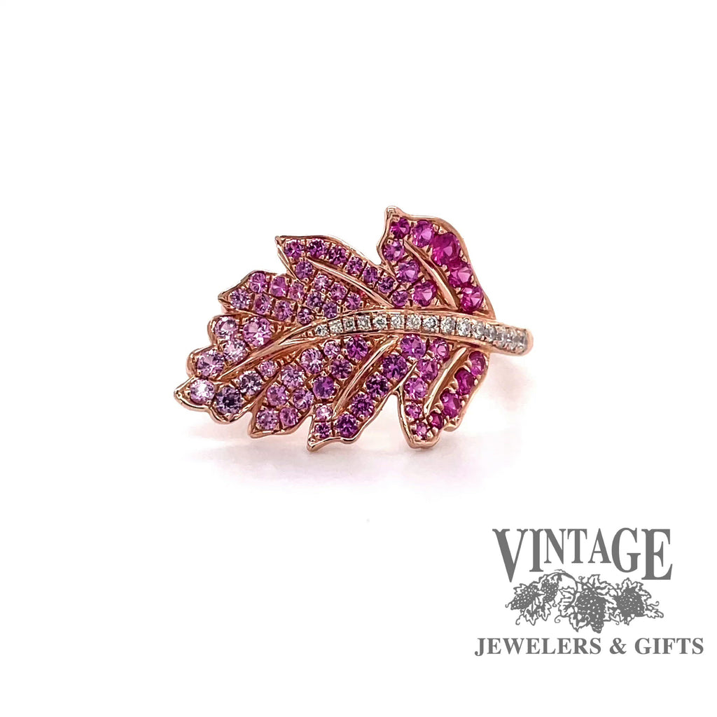 Revolving video of 14 karat rose gold leaf design ring with pave pink sapphires and diamonds
