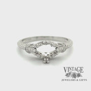 Revolving video of 14 karat white gold Edwardian inspired diamond semi-mount ring