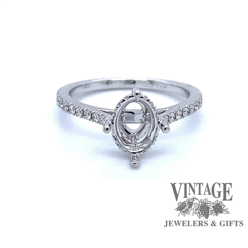 Revolving video of 14 karat white gold diamond semi mount ring for oval stone