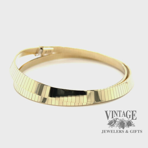 Revolving video of 16” flat 6mm 14k gold omega necklace, doubled over