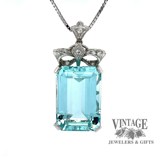 Revolving video of  Aquamarine and diamond vintage platinum pendant