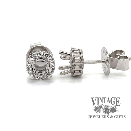 Revolving video of 18 karat white gold diamond halo semi mount earrings