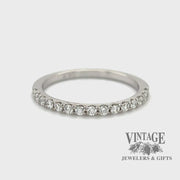 Revolving video of 14 karat white gold French set .19ctw VS diamond band ring