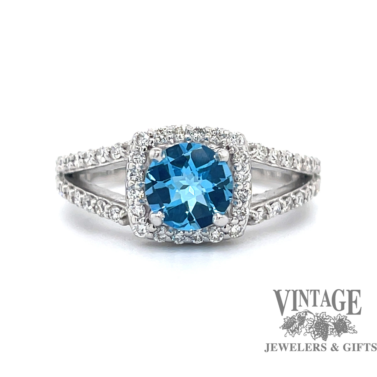 Blue Topaz and Diamond 14kw Gold Halo Ring