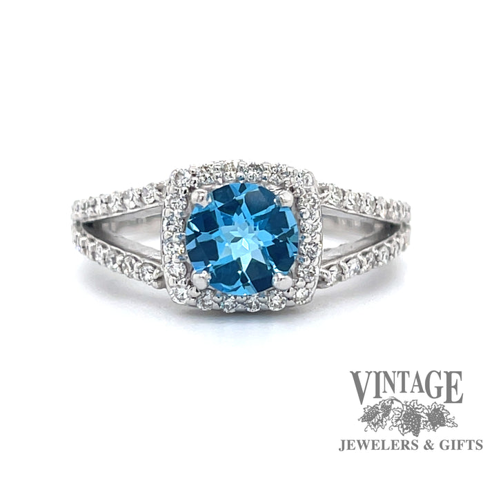 Blue topaz and diamond 14kw gold halo ring