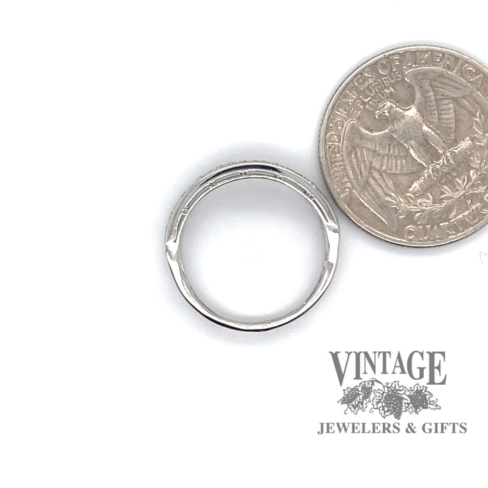 Platinum 1ctw diamond antique hand fabricated ring, shown with quarter for size reference