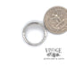 Platinum 1ctw diamond antique hand fabricated ring, shown with quarter for size reference
