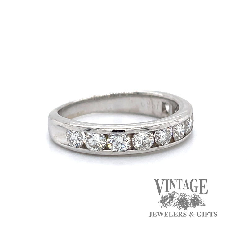 18 karat white gold channel set diamond band, angled