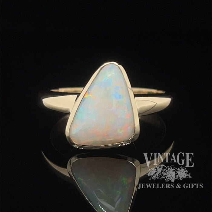 Natural white opal in 14ky gold ring