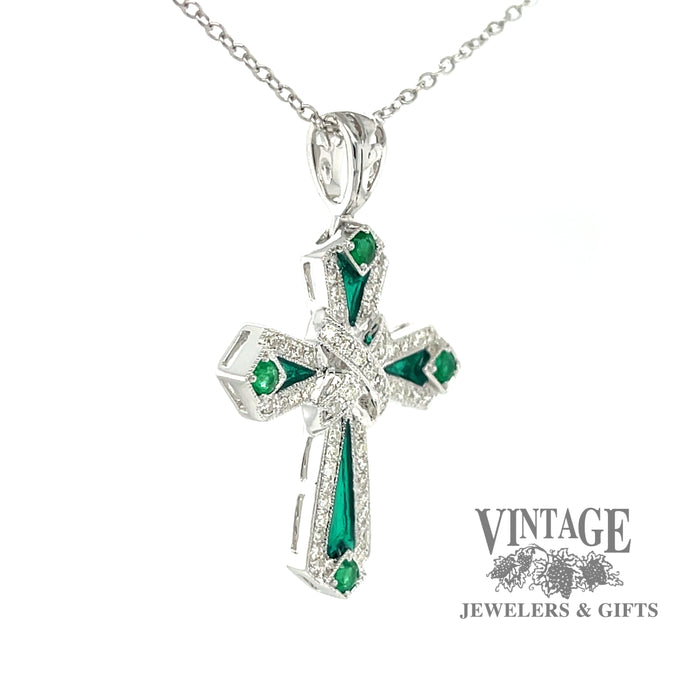 14 karat white gold emerald, diamond and enamel cross pendant, angled view