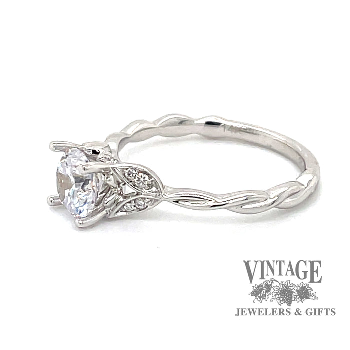 14 karat white gold diamond semi mount engagement ring with diamond leaf design, angled side view