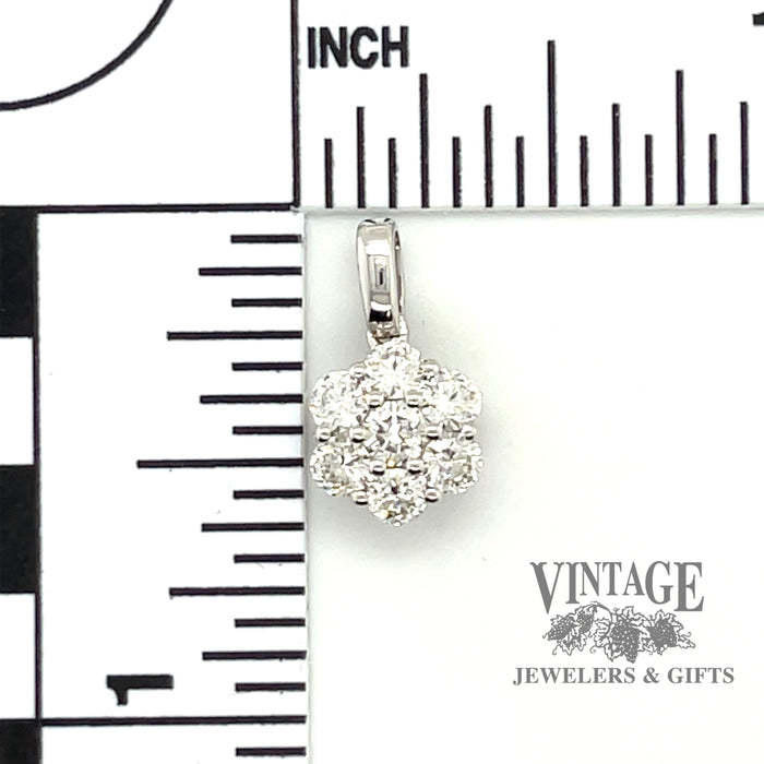 White gold 7 diamond cluster pendant.