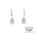 14 karat white gold diamond huggie drop earrings with stunning teal colored tourmalines, rear view