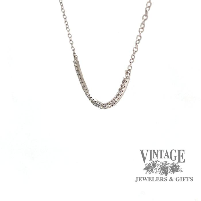 Side view of 14 karat white gold diamond choker necklace
