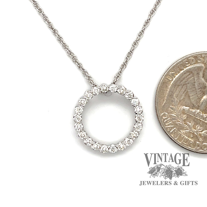 Classic 14 karat white gold .50 carat total weight diamond circlet necklace, shown with quarter for size reference
