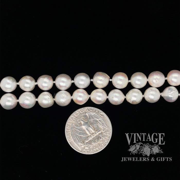 14” double pearl strand with 14ky gold clasp quarter for scale