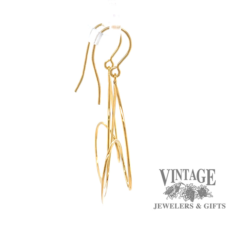 14k spiral drop earrings from side.
