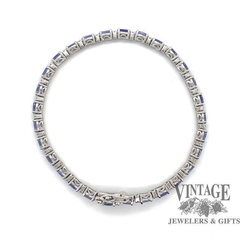 Tanzanite and diamond 18kw gold tennis bracelet top