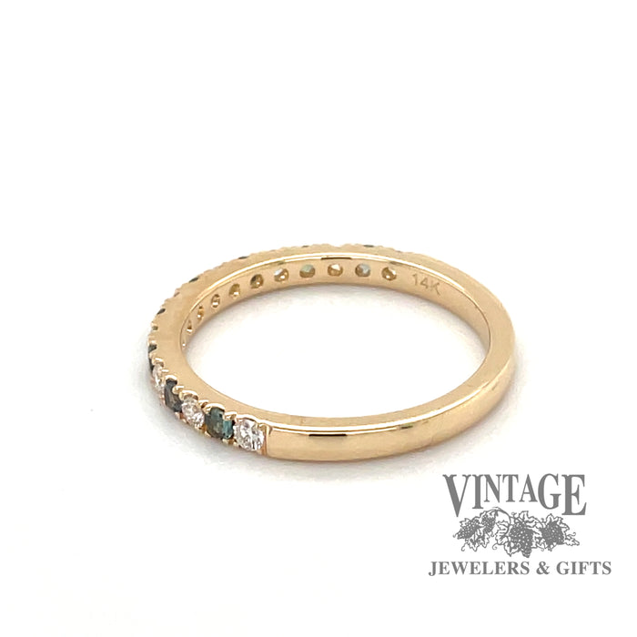 14 karat yellow gold band with alternating round brilliant diamonds and emeralds, side view