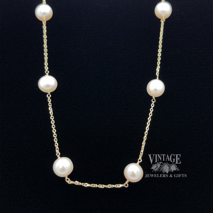 14ky gold 16" Pearl station necklace 
