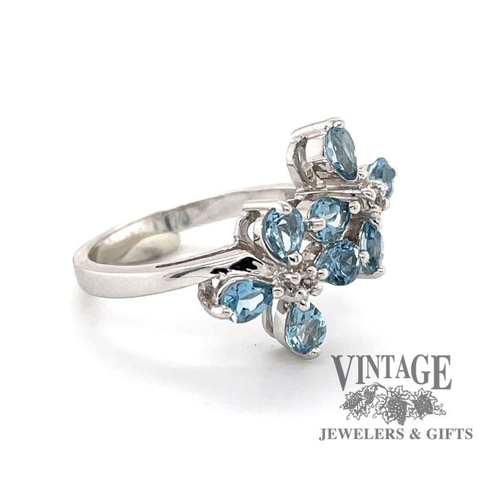 Pear shaped aquamarine cluster ring, angled side view