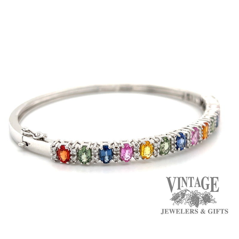 14 karat white gold multi colored sapphire bangle bracelet, angled view