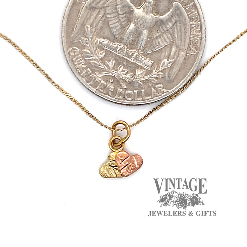 Black Hills Gold heart shaped leaf necklace quarter for scale