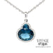 14 karat white gold 2.86 carat total weight Blue Topaz and diamond halo necklace