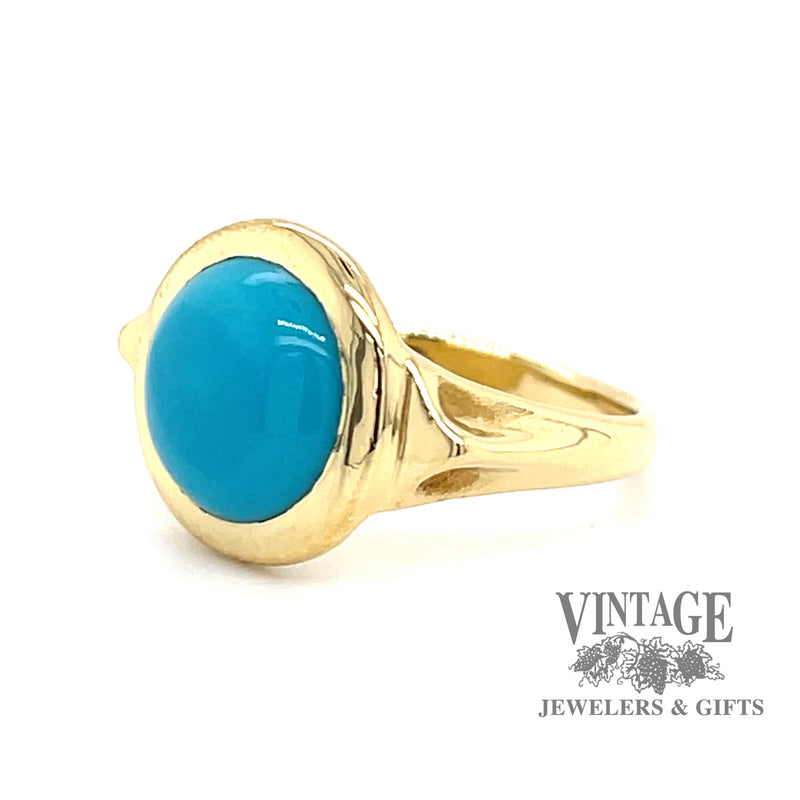 18 karat yellow gold turquoise cabachon bezel set ring, angled view