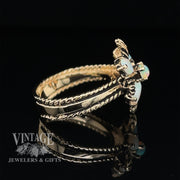 14 karat yellow gold opal flower motif cluster ring, side view