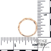 Braided 14kr gold diamond ring scale