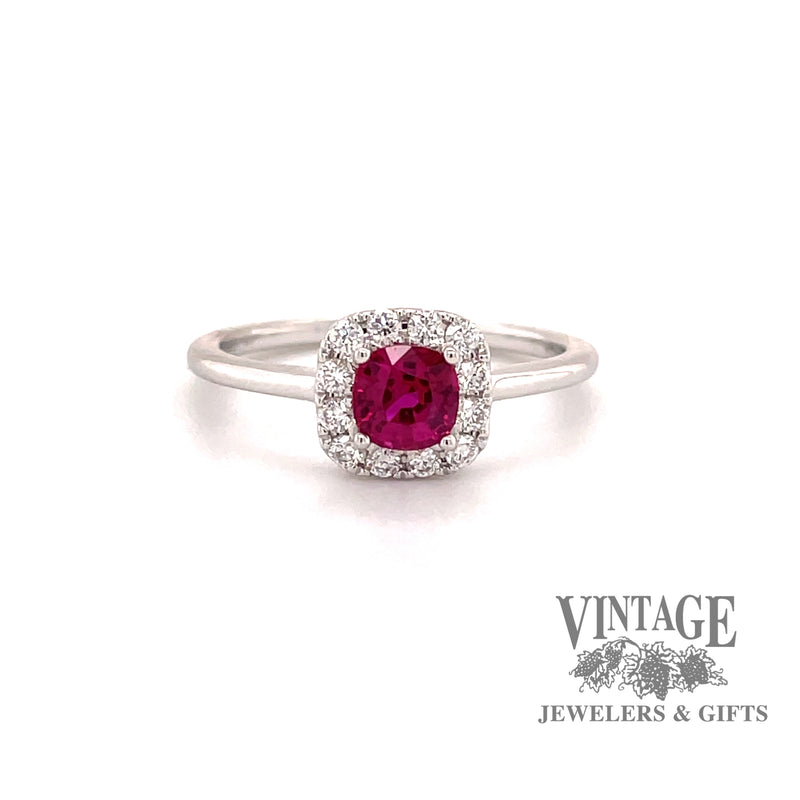 14 karat white gold ruby ring with diamond  halo 