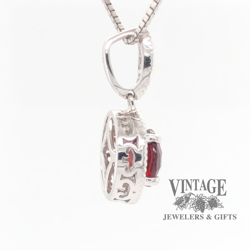14 karat white gold 1.5 carat garnet and diamond halo pendant, side view