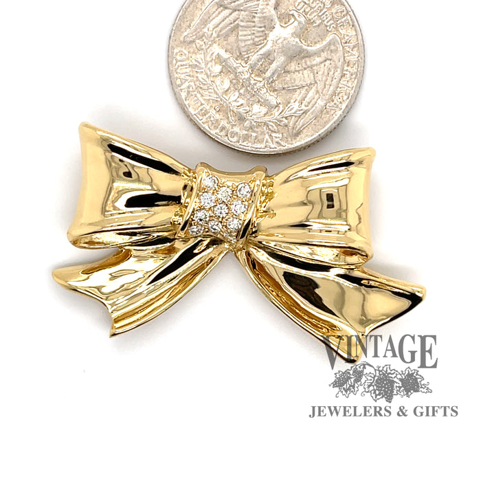 Herbert Rosenthal 18ky gold and diamond bow pin.