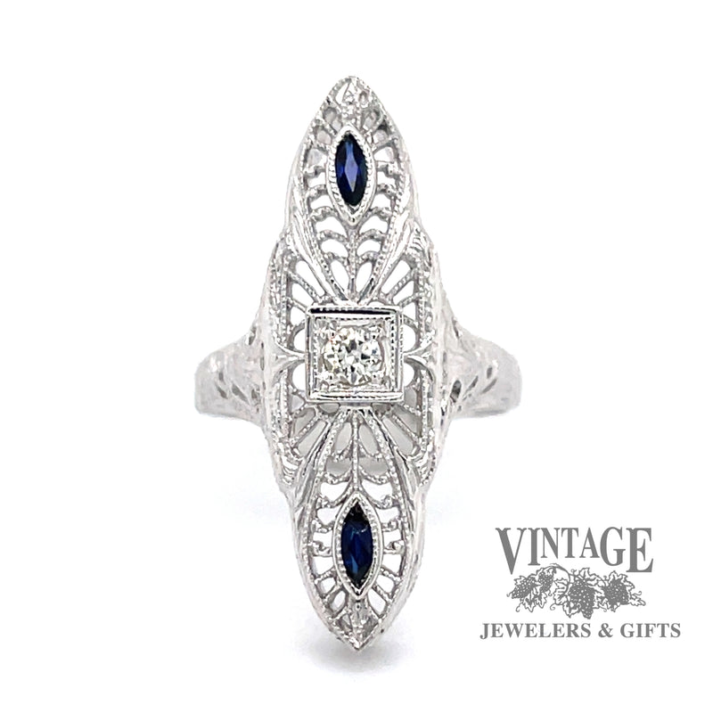 18 karat white gold vintage filigree elongated sapphire and diamond ring