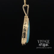 14 karat yellow gold 9.63ct Pear shape opal with diamonds pendant, side view