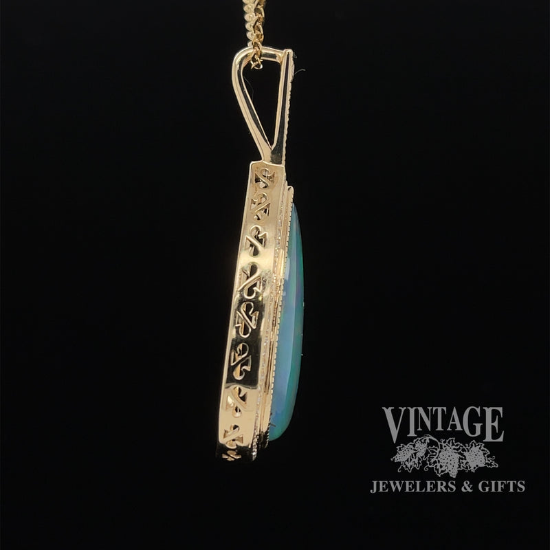 14 karat yellow gold 9.63ct Pear shape opal with diamonds pendant, side view