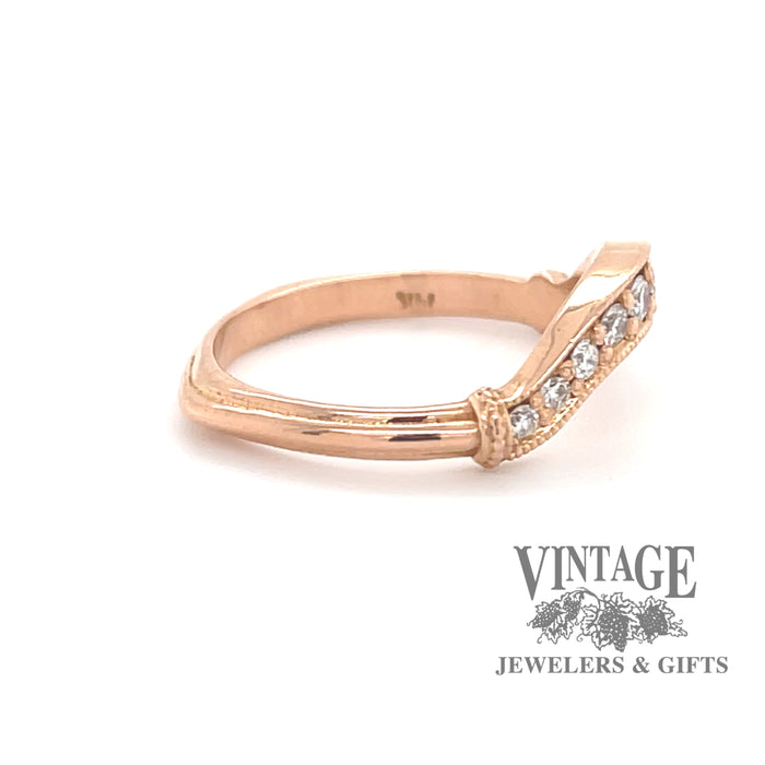 14K rose gold curved diamond wedding band, side view.