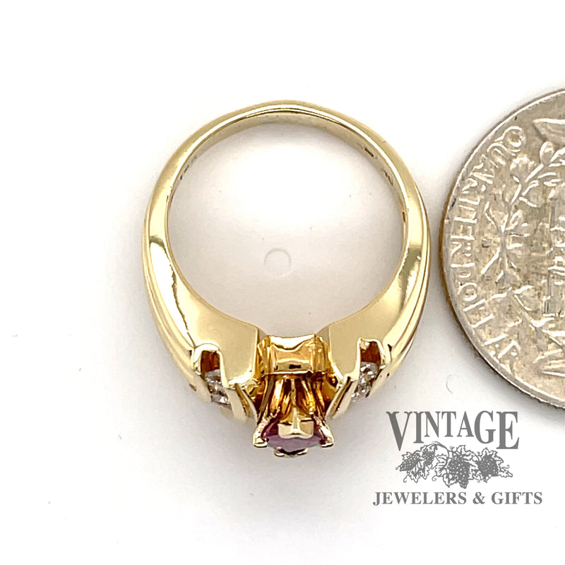 14 karat yellow gold .95 carat marquise pink tourmaline and diamond ring, side view through finger shown next to quarter for size reference