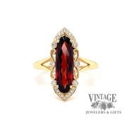 14 karat yellow gold 2.58 carat oval garnet and diamond ring
