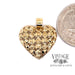 Diamond cut heart pendant in 14ky quarter for scale