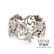 18 karat white gold .24ctw diamond floral motif band ring